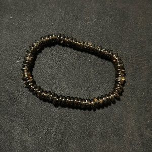 Kids gently used dark brown beaded 2.5 “ stretchy bracelet.